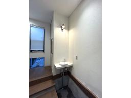 １階店舗奥洗面台